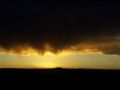 Sunset mingles with an approaching storm.jpg